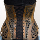 Illustration for article titled Where armor meets corset
